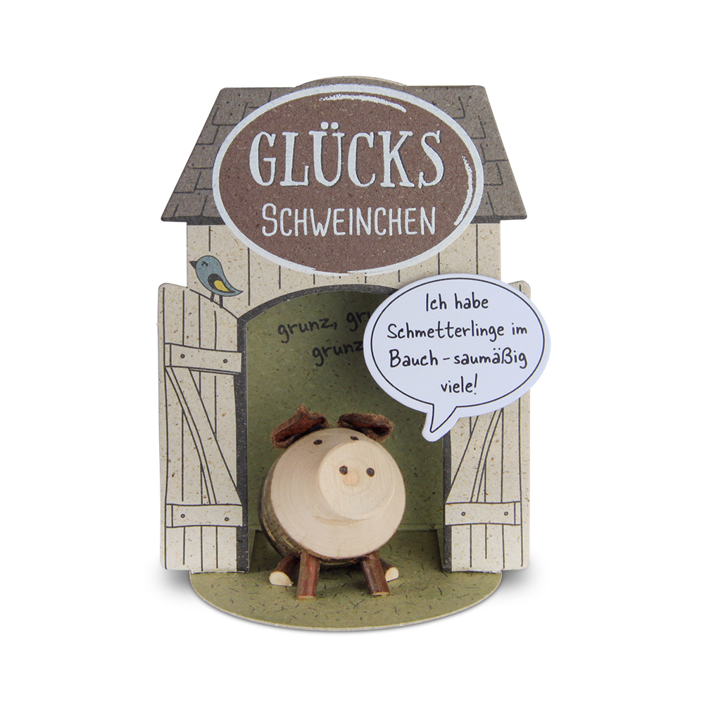 Glücksschweinchen sitzend: "Ich habe…"