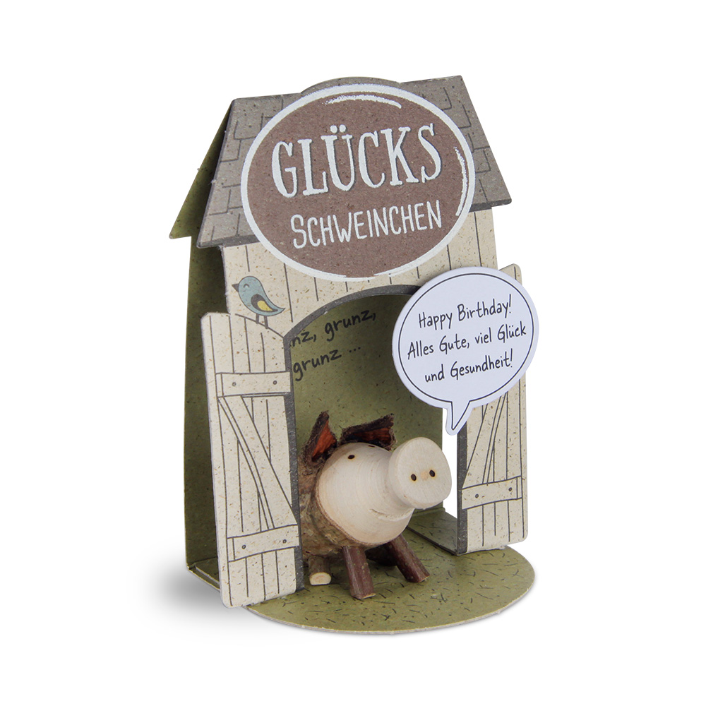 Glücksschweinchen sitzend: "Happy Birthday..."