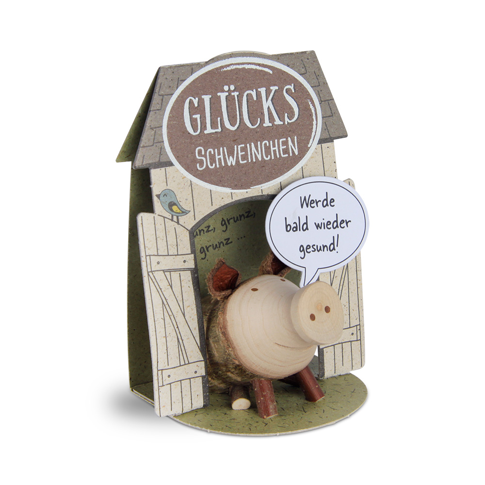 Glücksschweinchen sitzend: "Werde bald wieder..."