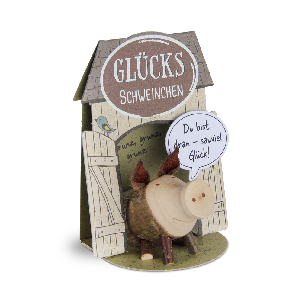 Glücksschweinchen sitzend: "Du bist dran..."