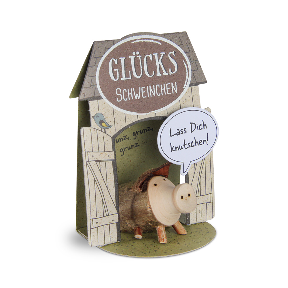 Glücksschweinchen sitzend: "Lass Dich knutschen!"