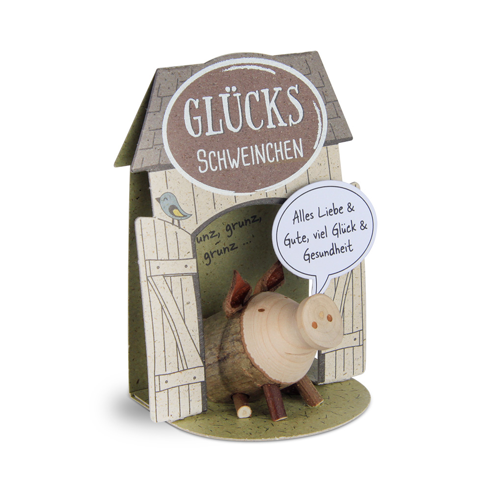 Glücksschweinchen sitzend: "Alles Liebe & Gute…"