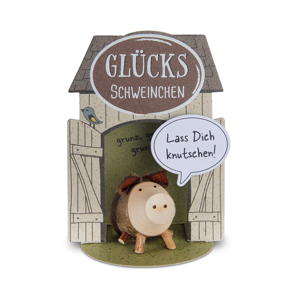 Glücksschweinchen sitzend: "Lass Dich knutschen!"