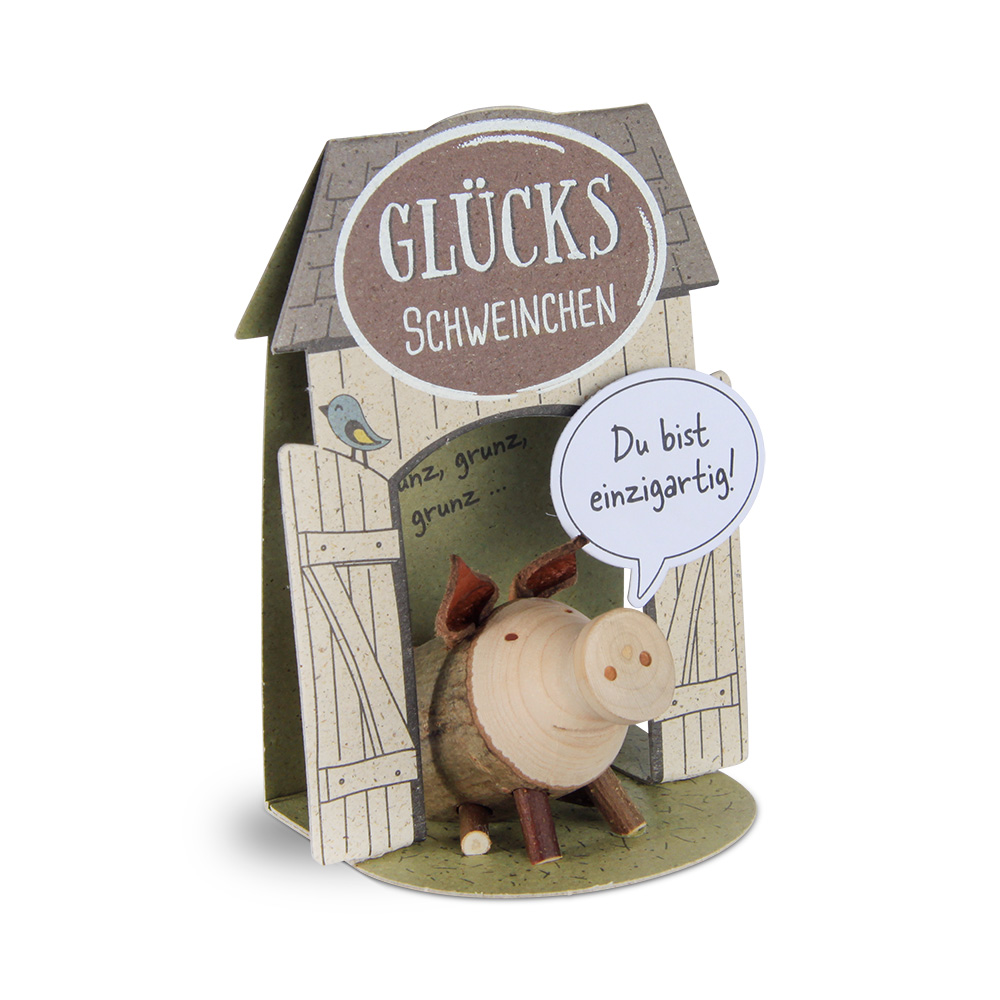 Glücksschweinchen sitzend: "Du bist einzigartig!"