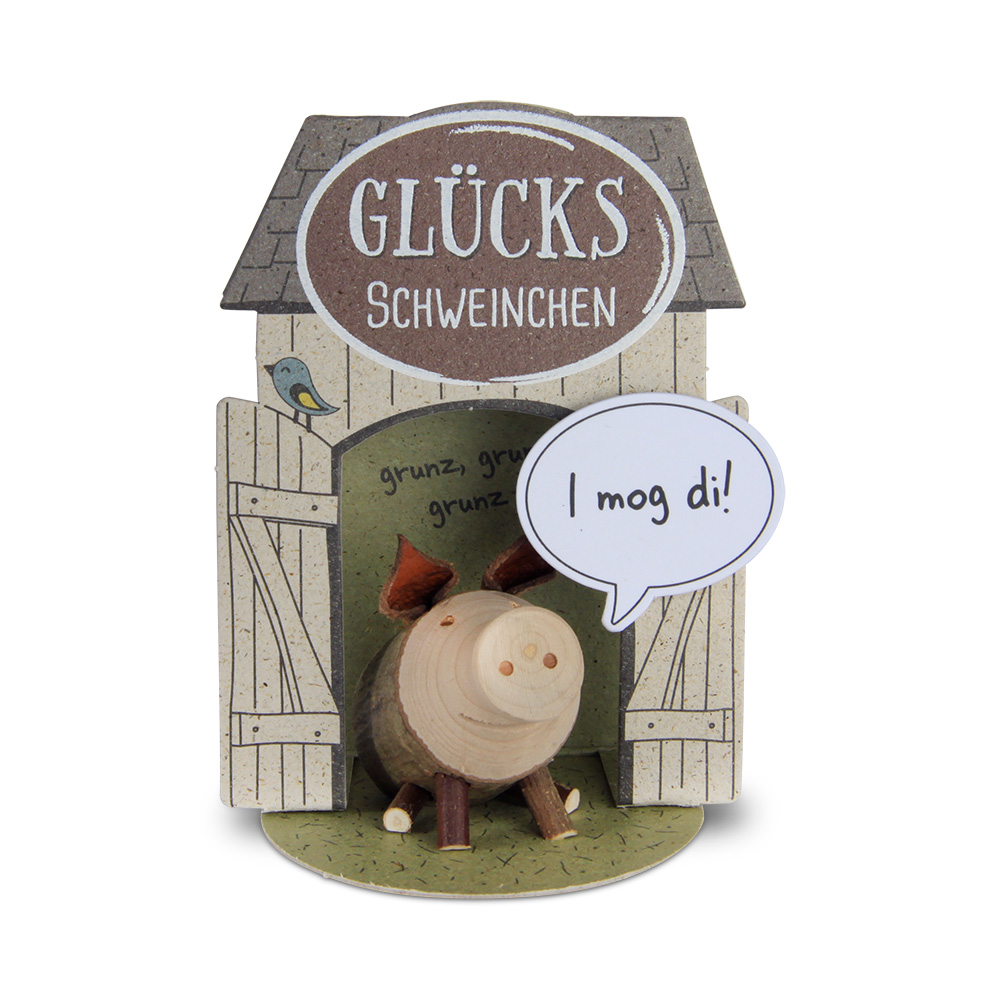 Glücksschweinchen sitzend: "I mog di!"