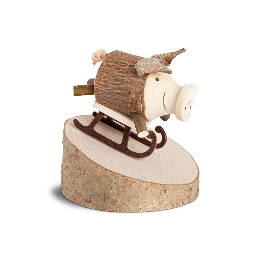 Glücksschweinchen Schlittenfahrer: "Möge das..."