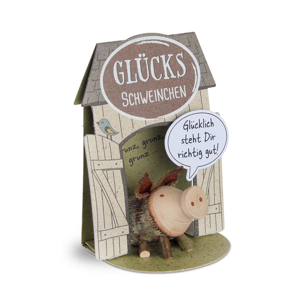 Glücksschweinchen sitzend: "Glücklich steht..."